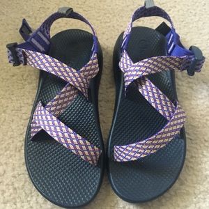 purple, blue, red, and yellow chacos